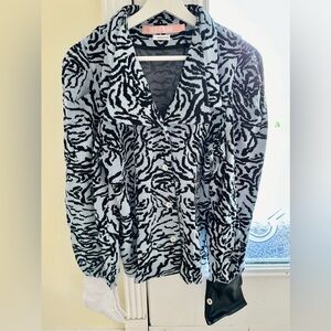 Woman’s sweater, new , designed in NY, made in China